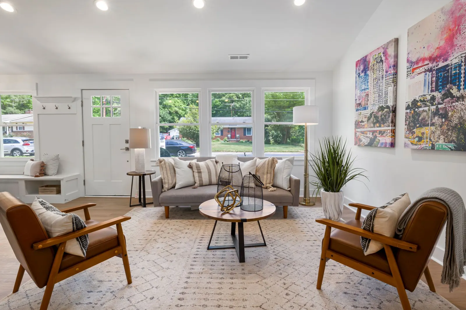 Bright, freshly cleaned living room with tidy furniture